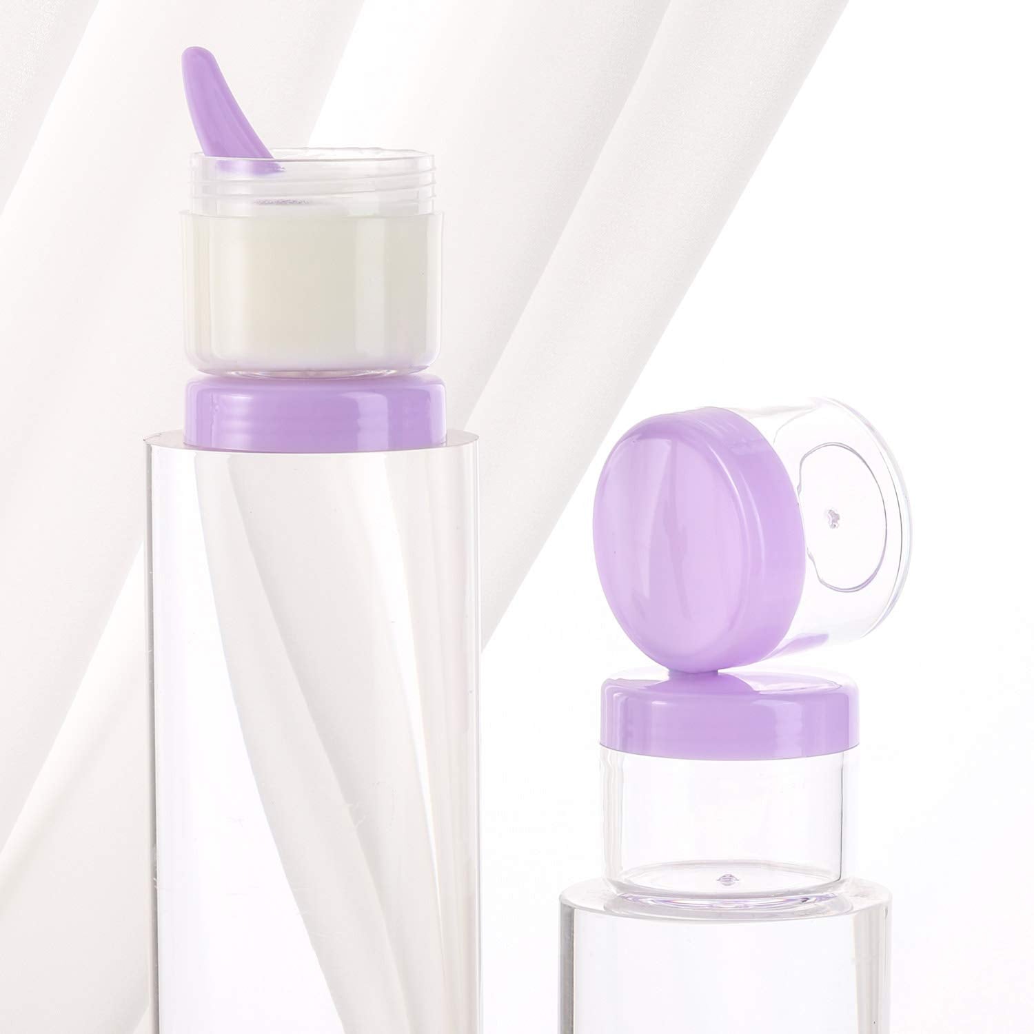Refillable Cosmetic Sample Jars - 100 Pack 20g (0.7oz) Purple Small Travel Containers with Lids + 10 Mini Makeup Spatulas - BPA Free-Velvo Beauty