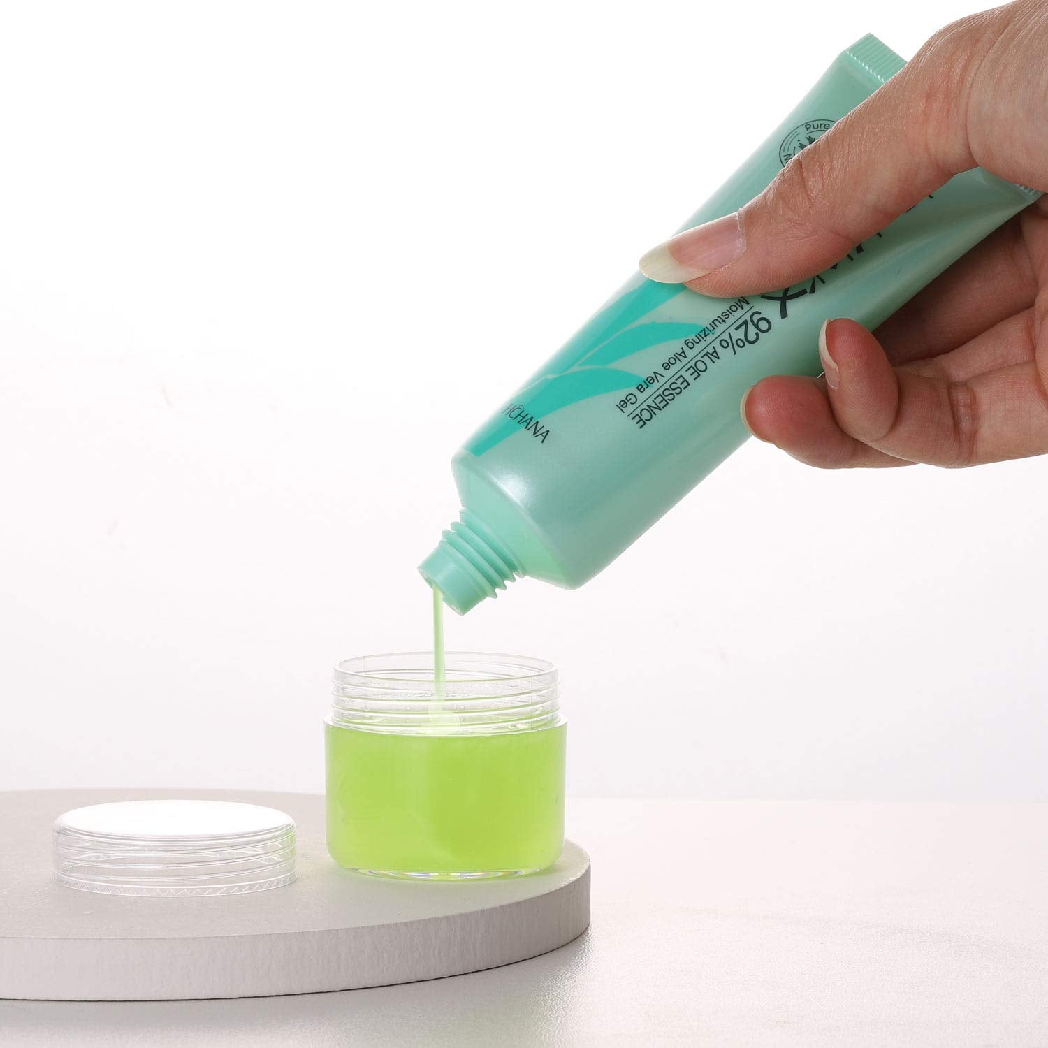 Refillable Cosmetic Sample Jars - 100 Pack 20g (0.7oz) Clear Small Travel Containers with Lids + 10 Mini Makeup Spatulas - BPA Free-Velvo Beauty