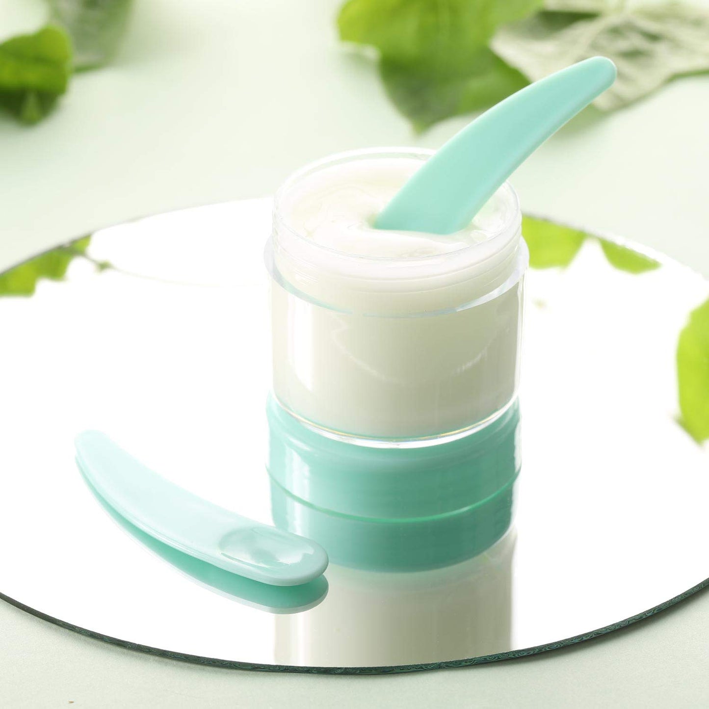 Refillable Cosmetic Sample Jars - 100 Pack 20g (0.7oz) Green Small Travel Containers with Lids + 10 Mini Makeup Spatulas - BPA Free-Velvo Beauty