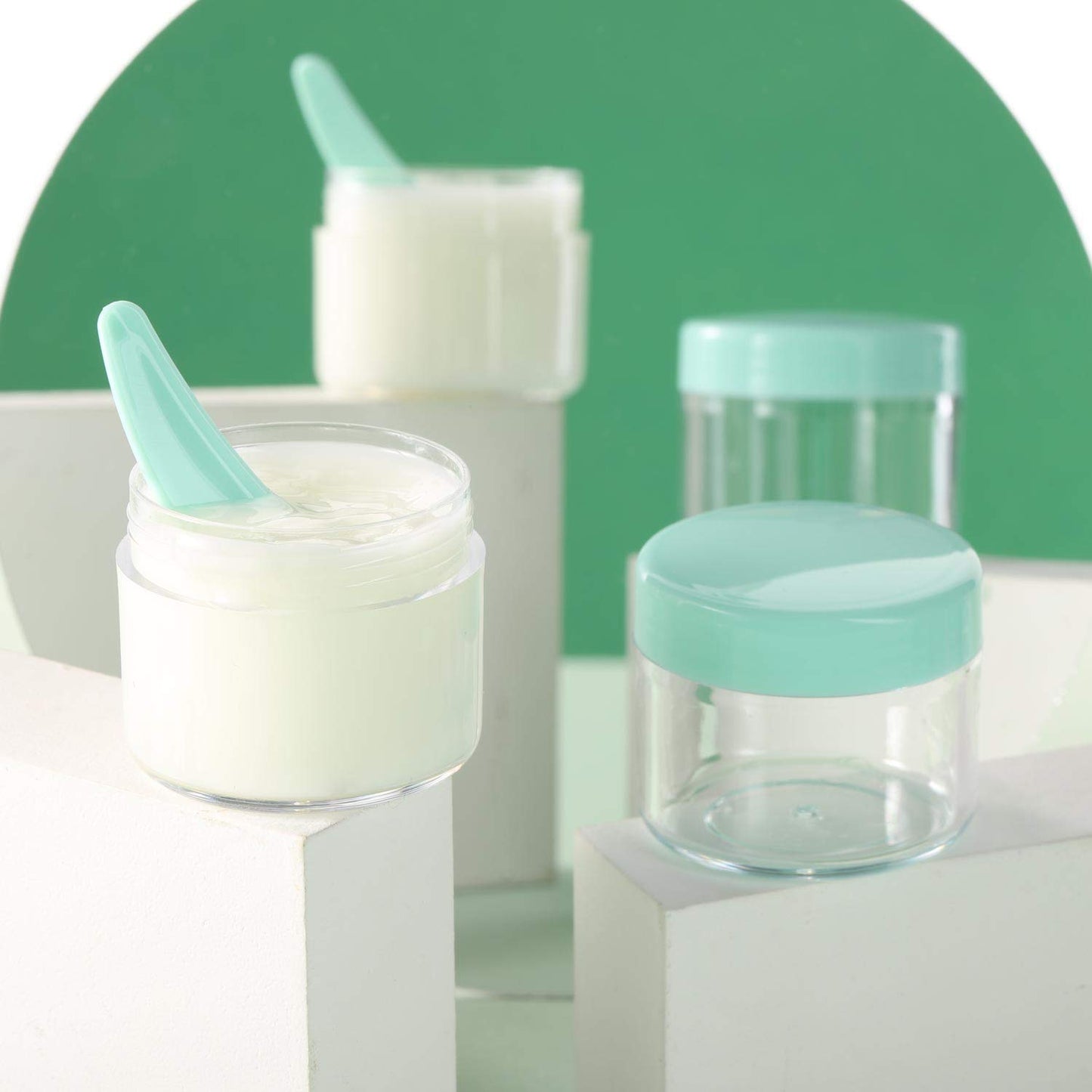 Refillable Cosmetic Sample Jars - 100 Pack 20g (0.7oz) Green Small Travel Containers with Lids + 10 Mini Makeup Spatulas - BPA Free-Velvo Beauty