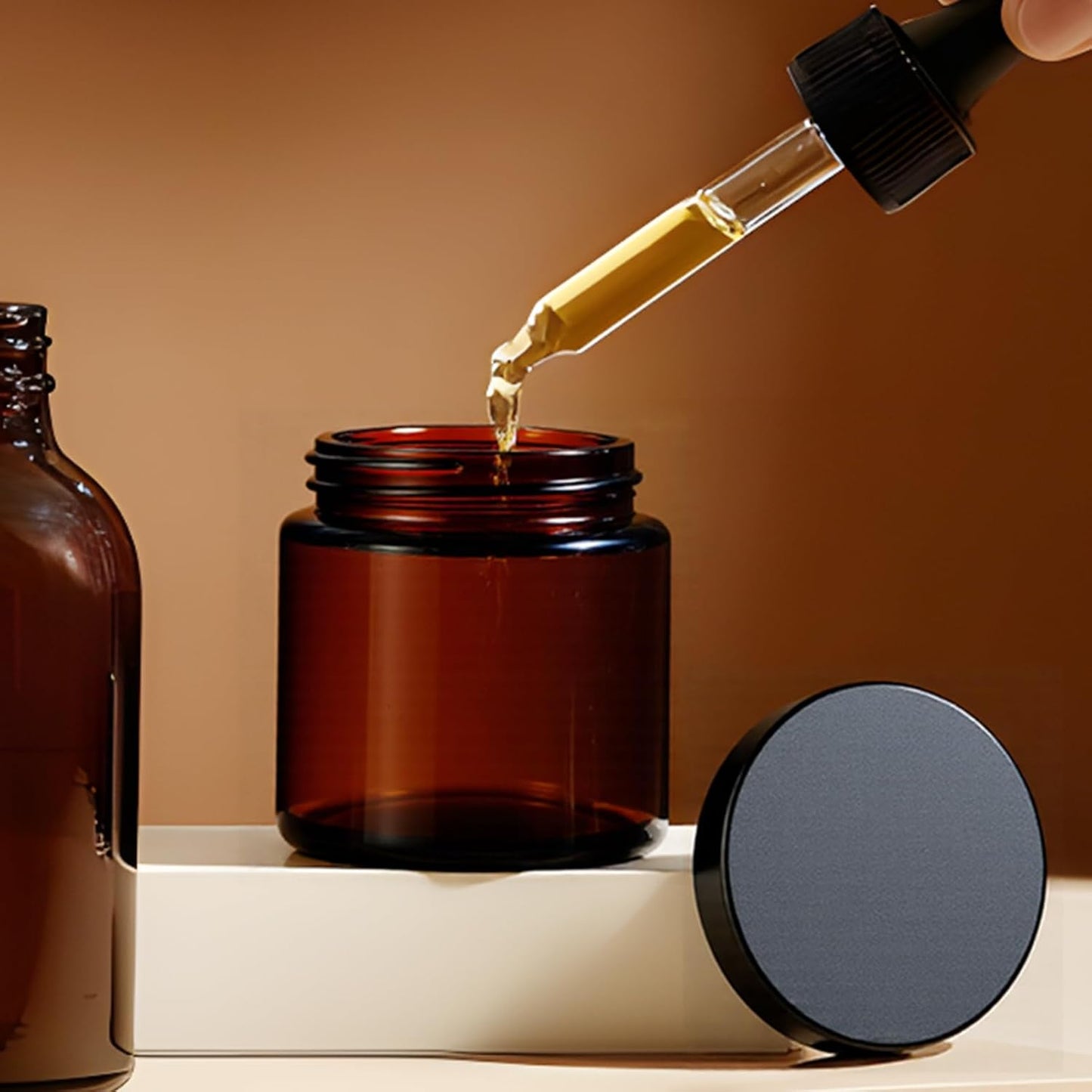 4 oz Glass Jars with Lids, Hoa Kinh 40 Pack Amber Small Glass Jars with Black Lids Empty Cosmetic Containers Airtight Round Glass Jar for Lotions, Powders and Ointments-Velvo Beauty