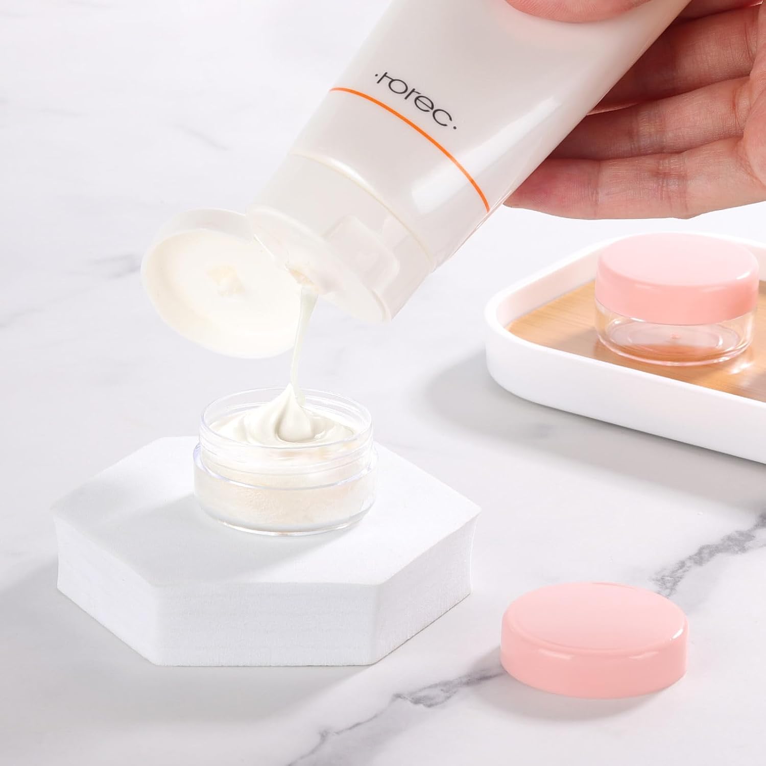 Refillable Cosmetic Sample Jars - 100 Pack 10g (0.35oz) Pink Small Travel Containers with Lids + 10 Mini Makeup Spatulas - BPA Free-Velvo Beauty