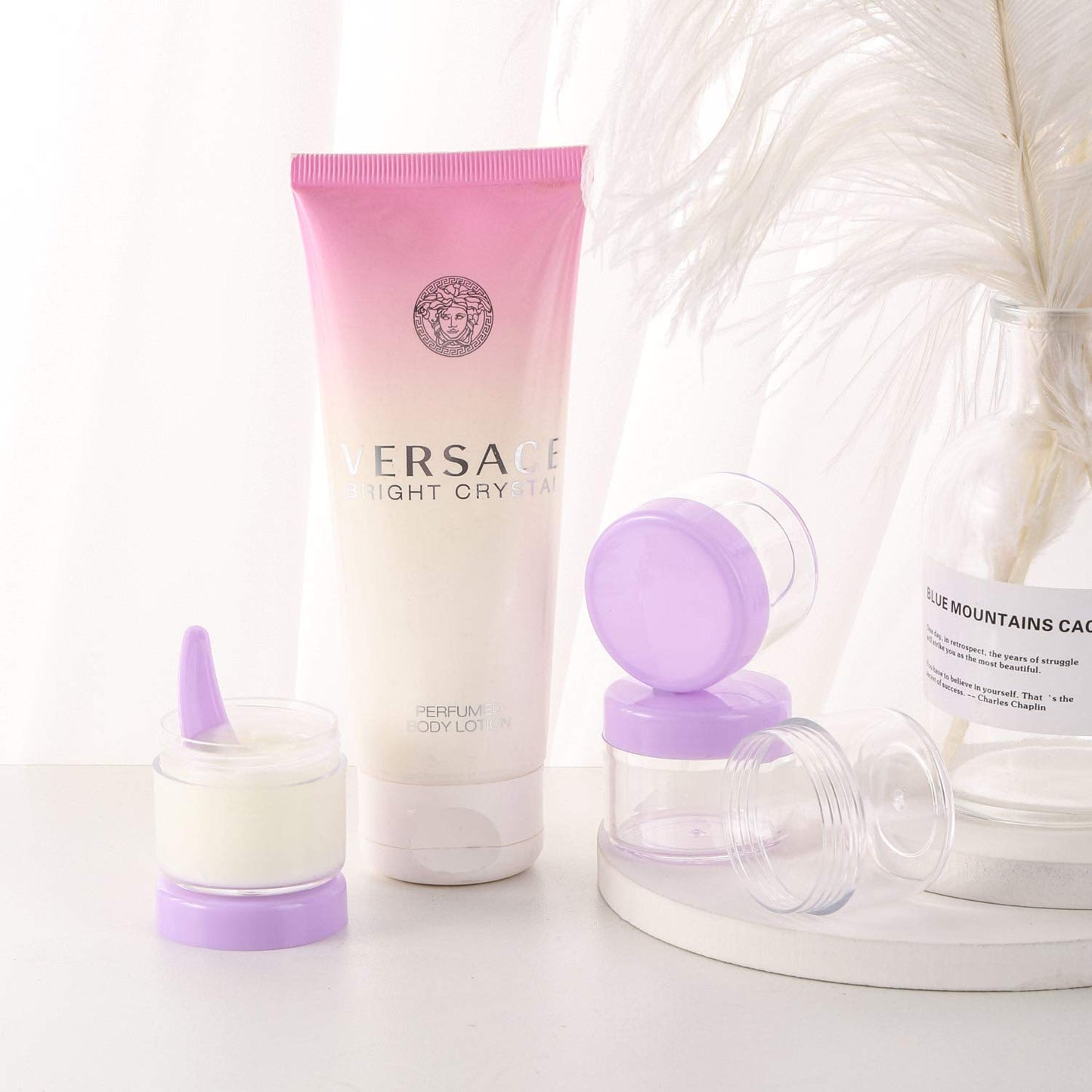 Refillable Cosmetic Sample Jars - 100 Pack 20g (0.7oz) Purple Small Travel Containers with Lids + 10 Mini Makeup Spatulas - BPA Free-Velvo Beauty