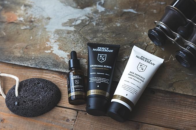 Percy Nobleman Age Defence Kit, a men's skincare set containing Charcoal Face Scrub (with Natural AHAs), ultra-hydrating Facial Serum (with Hyaluronic Acid), and Moisturiser (with Vitamin C)-Velvo Beauty