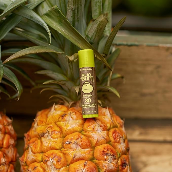 Sun Bum SPF 30 Sunscreen Lip Balm | Vegan and Cruelty Free Broad Spectrum UVA/UVB Lip Care with Aloe and Vitamin E for Moisturized Lips | Pineapple Flavor |.15 oz (Pack of 2)-Velvo Beauty
