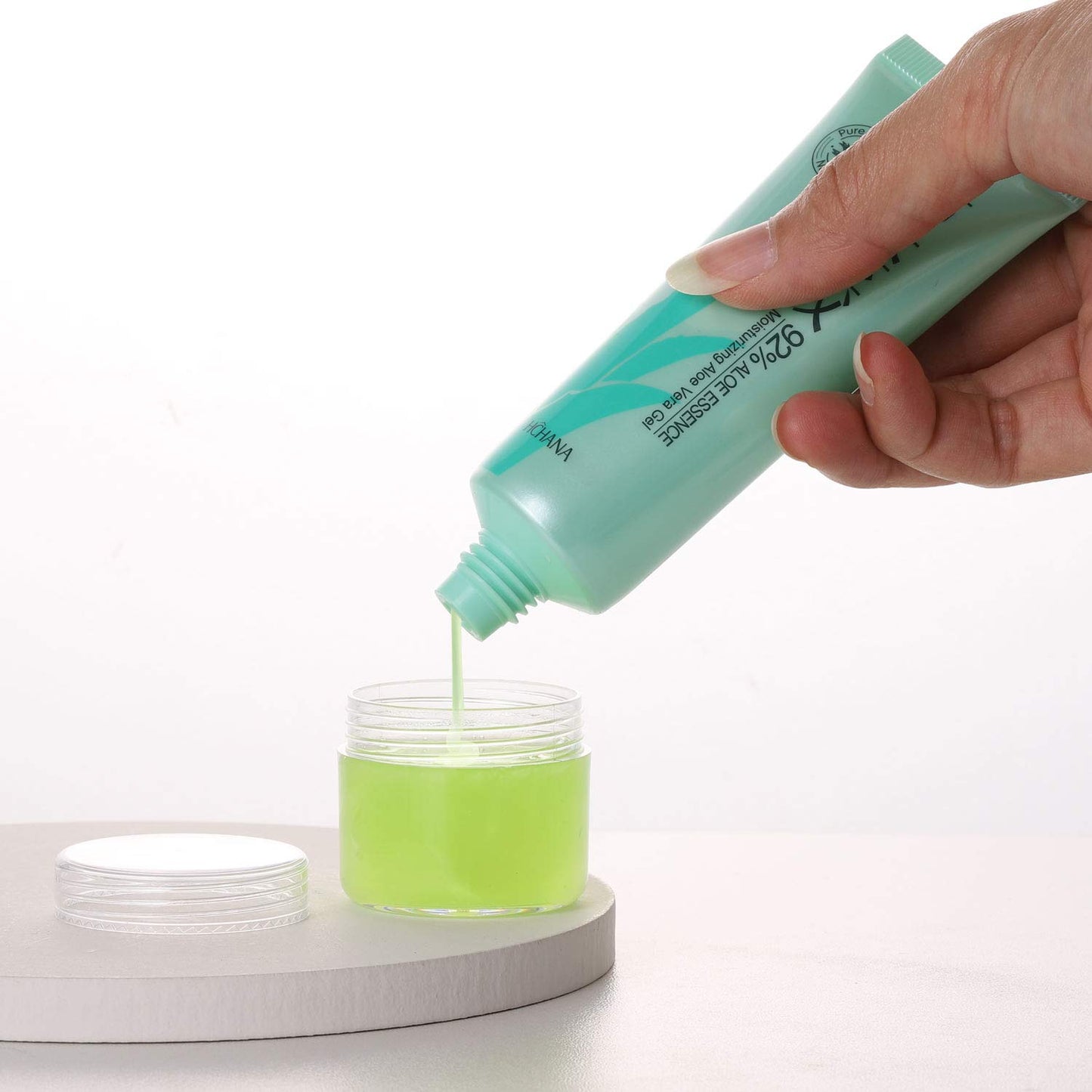 Refillable Cosmetic Sample Jars - 100 Pack 20g (0.7oz) Clear Small Travel Containers with Lids + 10 Mini Makeup Spatulas - BPA Free-Velvo Beauty