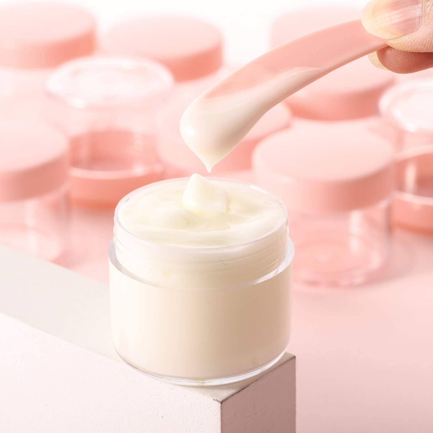 Refillable Cosmetic Sample Jars - 100 Pack 20g (0.7oz) Pink Small Travel Containers with Lids + 10 Mini Makeup Spatulas - BPA Free-Velvo Beauty