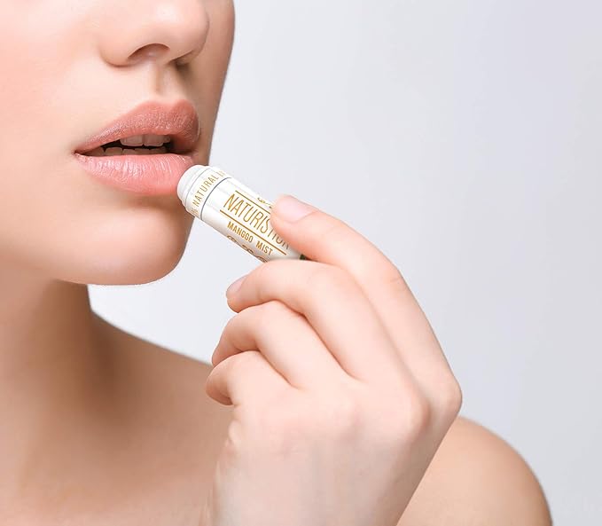 32-Pack Lip Balm in Bulk by Naturistick. Assorted Scents. 100% Natural Ingredients. Includes Mini Display Fishbowl. Best Beeswax Chapstick for Dry, Chapped Lips. Made in USA-Velvo Beauty