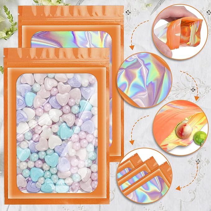ANZNKU 100 Pcs Smell Proof Mylar Resealable Bags, Holographic Packaging Bags, Resealable Odor Foil Pouch Zip Bag with Clear Window for Food Storage and Lipgloss, Jewelry Lash (Orange, 4.7 x 7.9 Inch)-Velvo Beauty