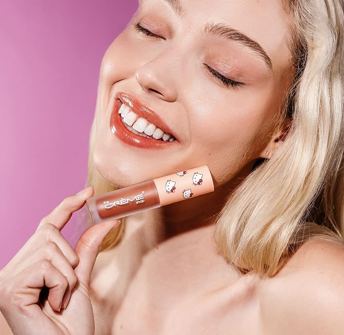 The Crème Shop x Hello Kitty Kawaii Kiss Hydrating, Rejuvenating Lip Oil with Nourishing Jojoba, Vitamin E & Luxurious Jelly Formula - Peach-Flavored (Tinted)-Velvo Beauty