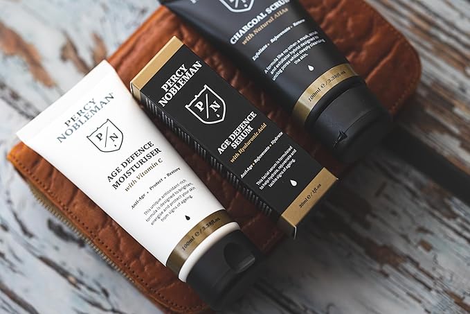 Percy Nobleman Age Defence Kit, a men's skincare set containing Charcoal Face Scrub (with Natural AHAs), ultra-hydrating Facial Serum (with Hyaluronic Acid), and Moisturiser (with Vitamin C)-Velvo Beauty