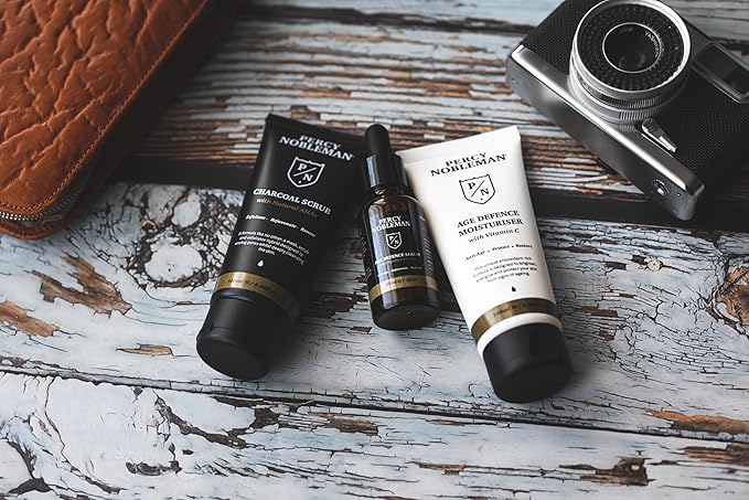 Percy Nobleman Age Defence Kit, a men's skincare set containing Charcoal Face Scrub (with Natural AHAs), ultra-hydrating Facial Serum (with Hyaluronic Acid), and Moisturiser (with Vitamin C)-Velvo Beauty